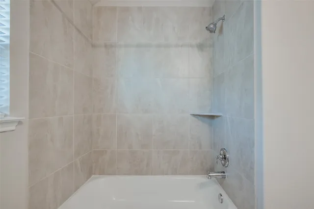 an aerial view of a building with outdoor space