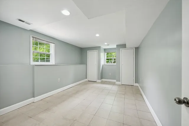 an empty room with windows