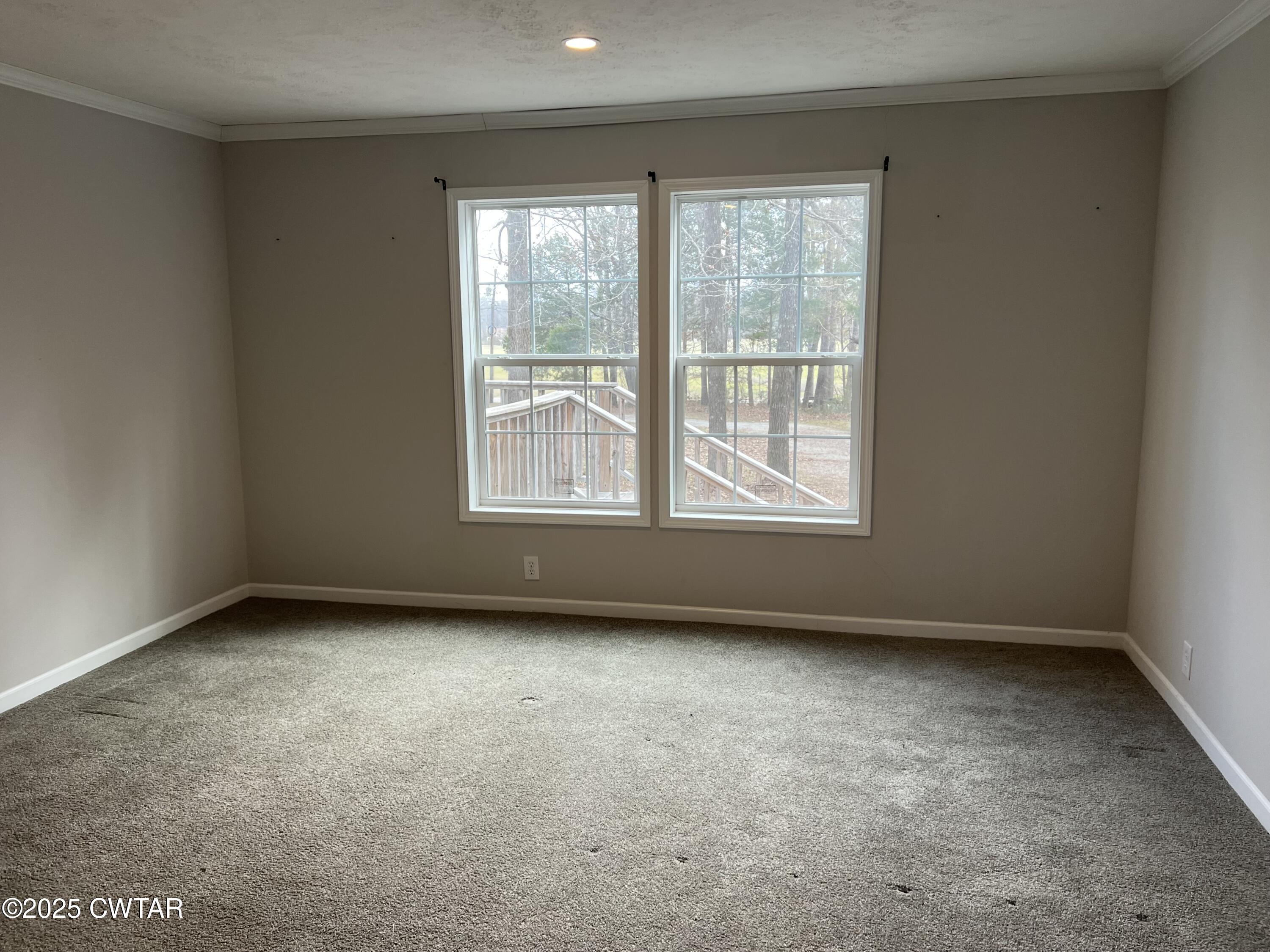 80 Simmons Road Pinson, TN 38366 - Photo 21 of 32 an empty room with a window