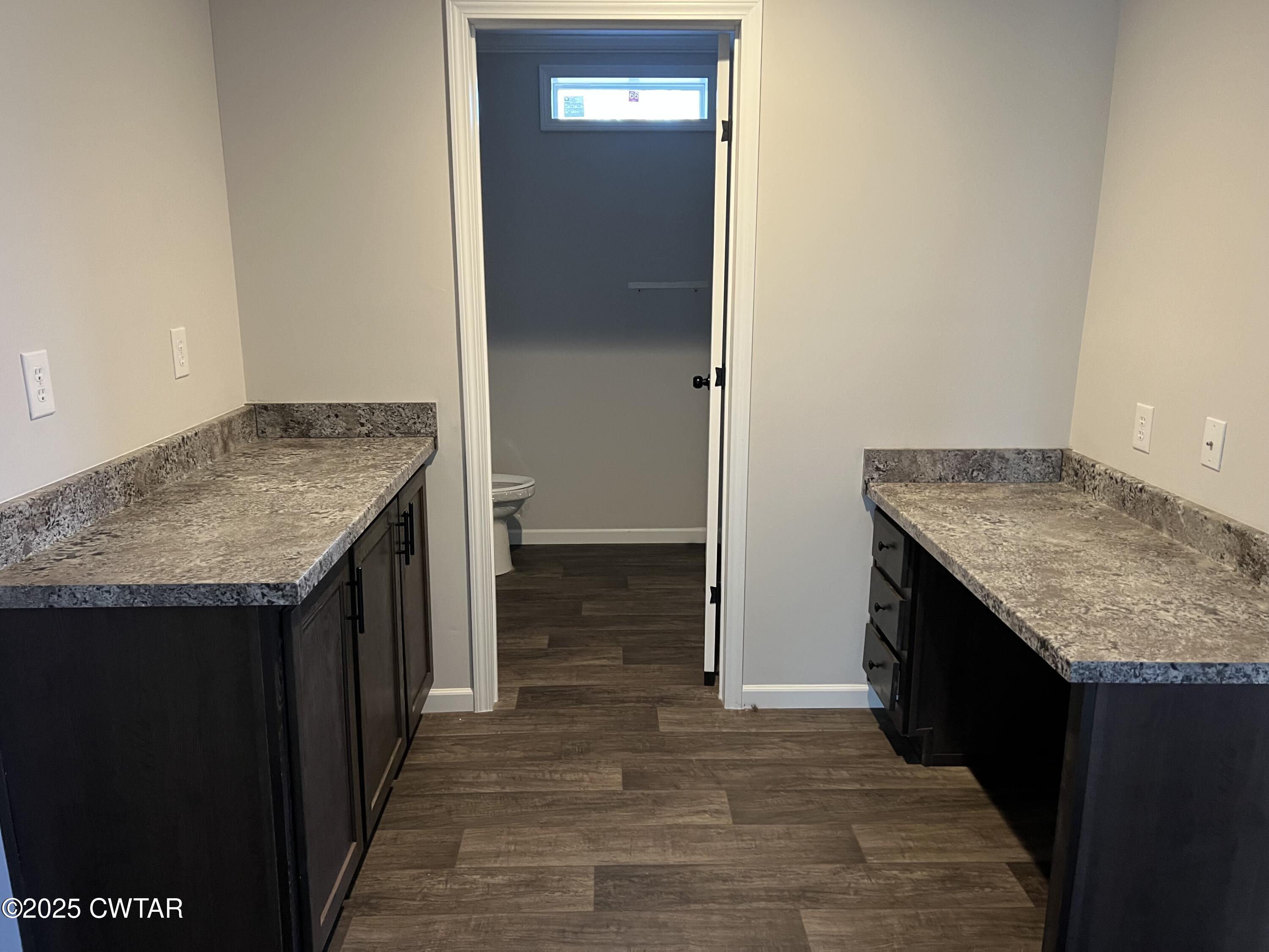 80 Simmons Road Pinson, TN 38366 - Photo 28 of 32 a utility room with granite countertop cabinets and sink