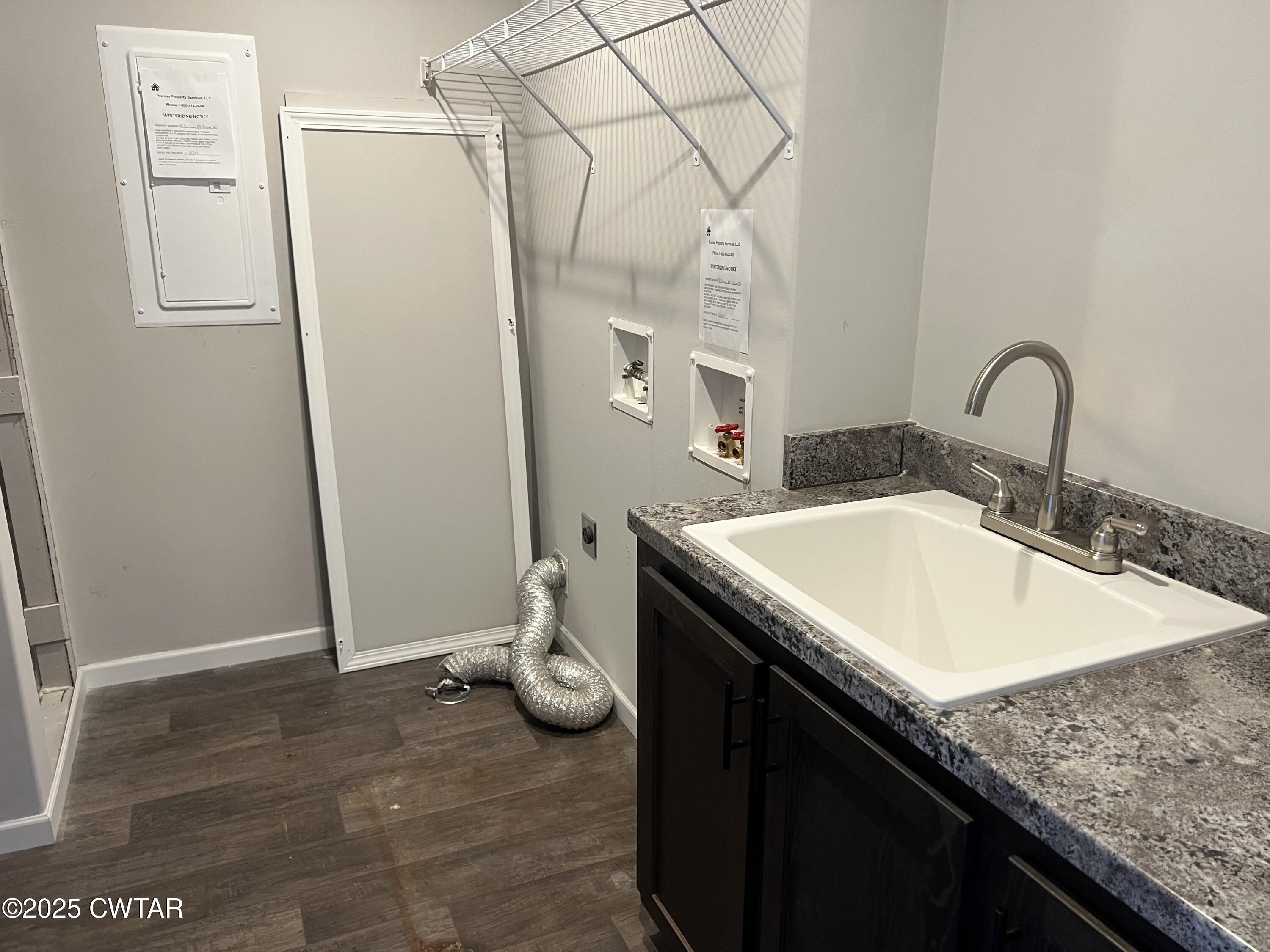 80 Simmons Road Pinson, TN 38366 - Photo 29 of 32 a bathroom with a granite countertop sink and a mirror