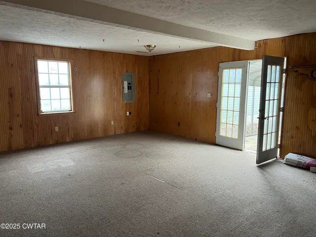 an empty room with windows