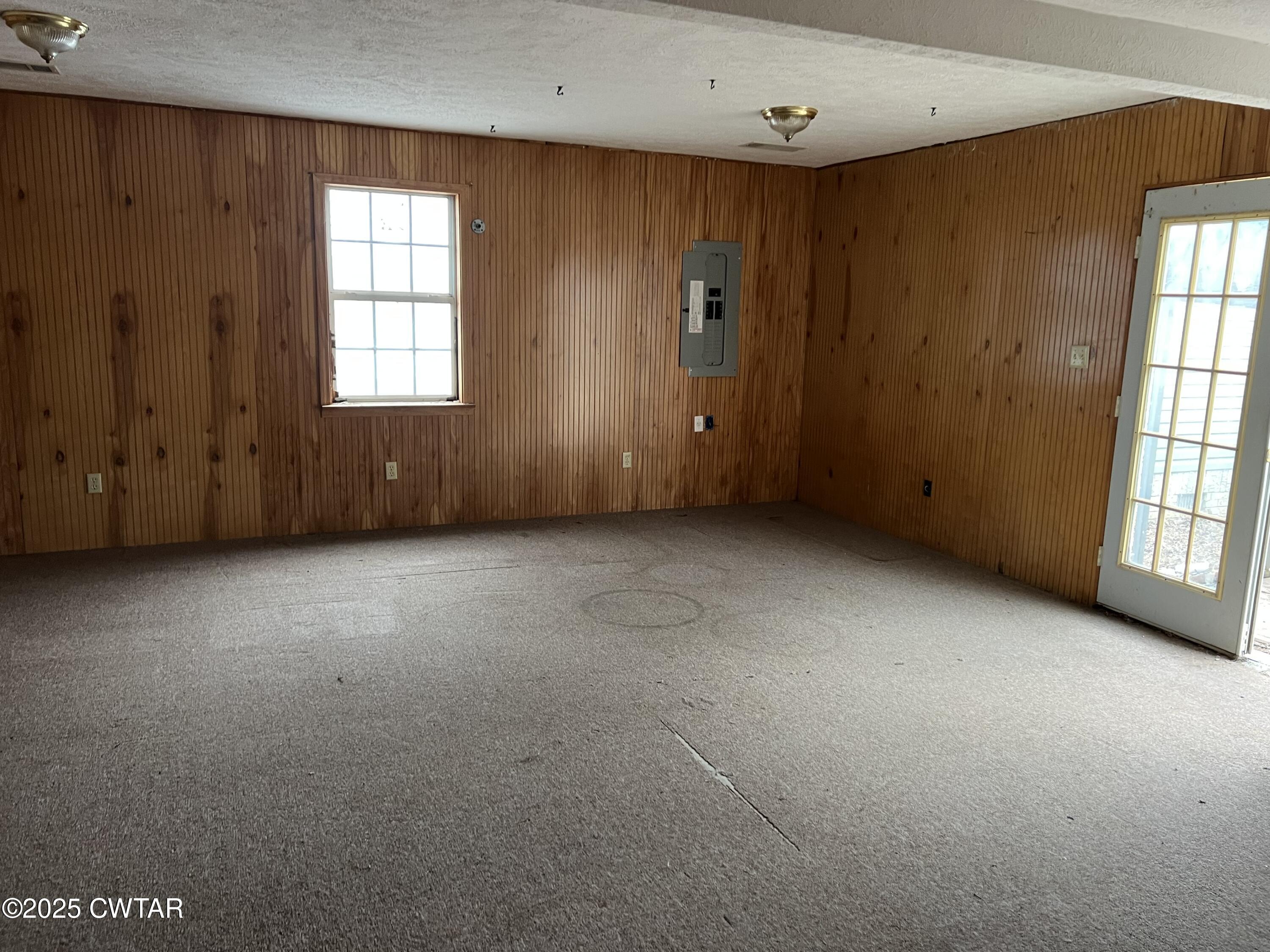 80 Simmons Road Pinson, TN 38366 - Photo 31 of 32 an empty room with windows