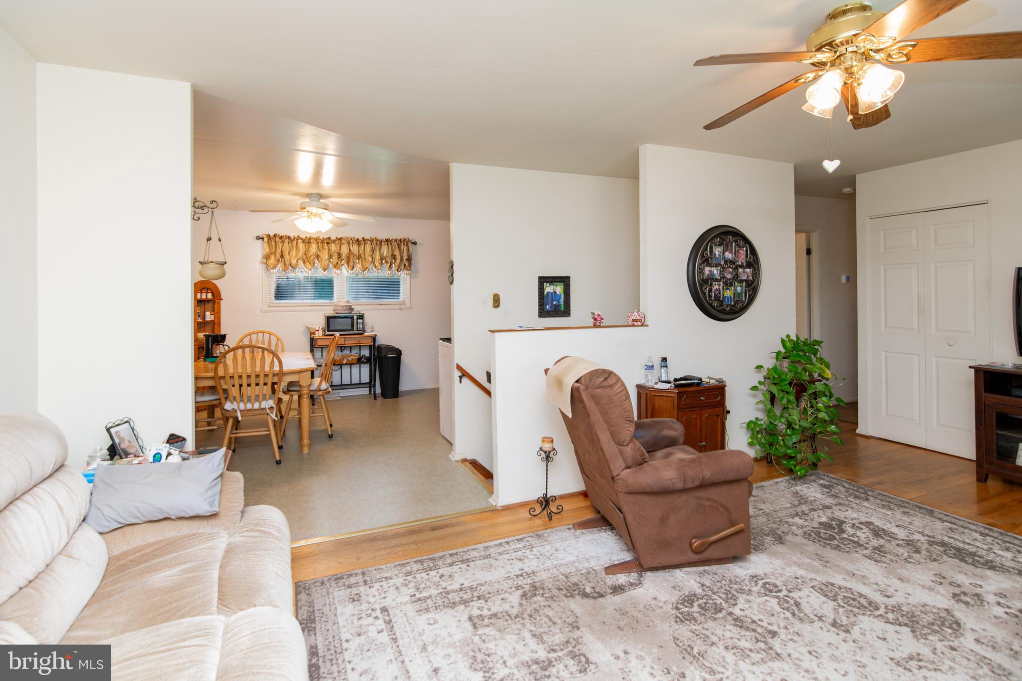 2014 Cherry Road Edgewood, MD 21040 - Photo 3 of 25 a living room with furniture a clock and a window