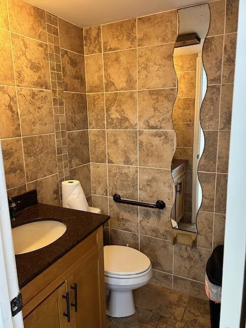 1775 Blount Road, Unit 409 Pompano Beach, FL 33069 - Photo 3 of 3 a bathroom with a sink toilet and shower