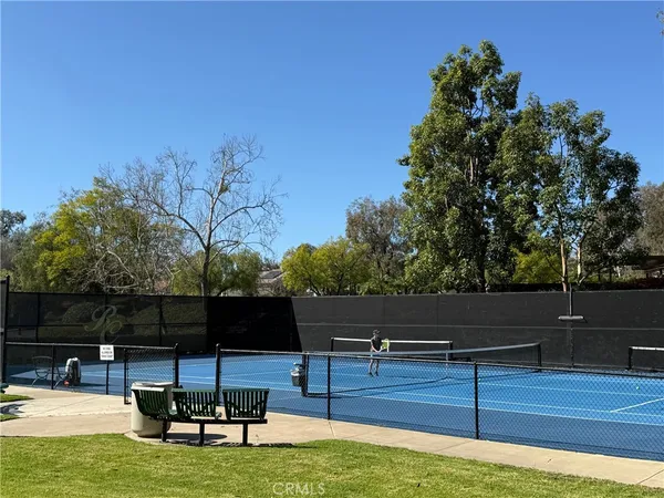 a view of a backyard of the house