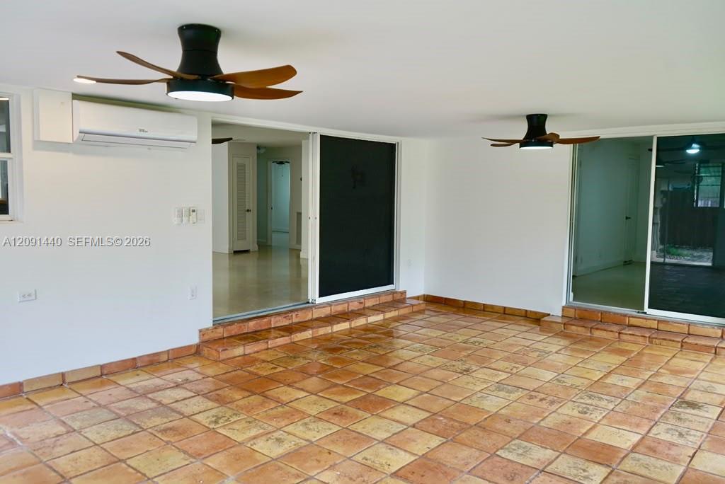 3404 Barton Road Pompano Beach, FL 33062 - Photo 7 of 28 sunroom/den