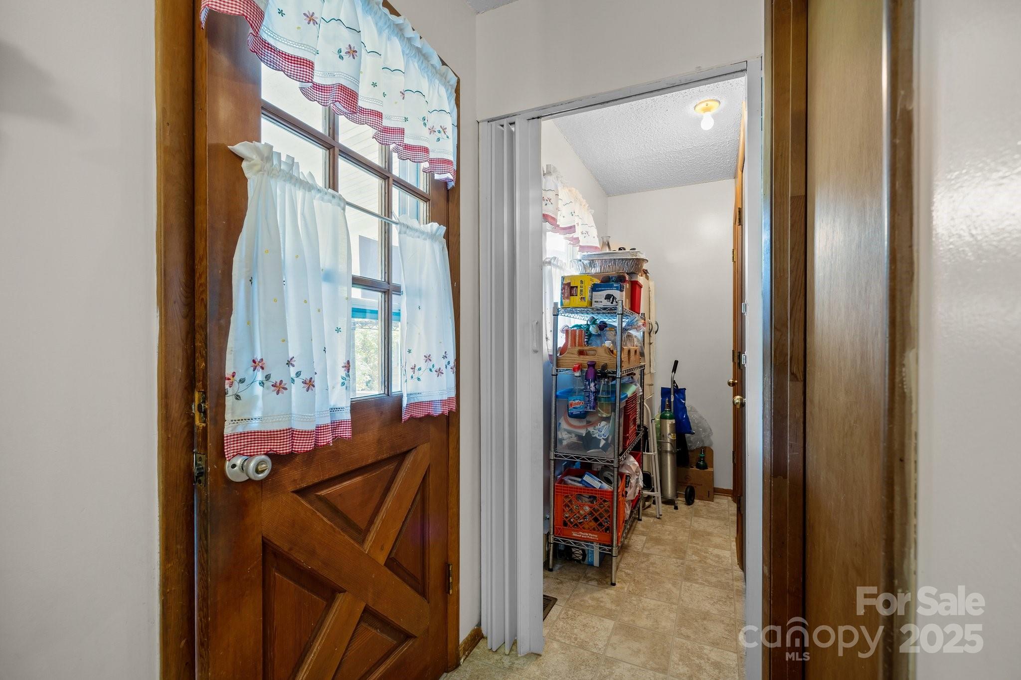 204 Cedar Hill Road Asheville, NC 28806 - Photo 11 of 25 a view of a hallway with workspace