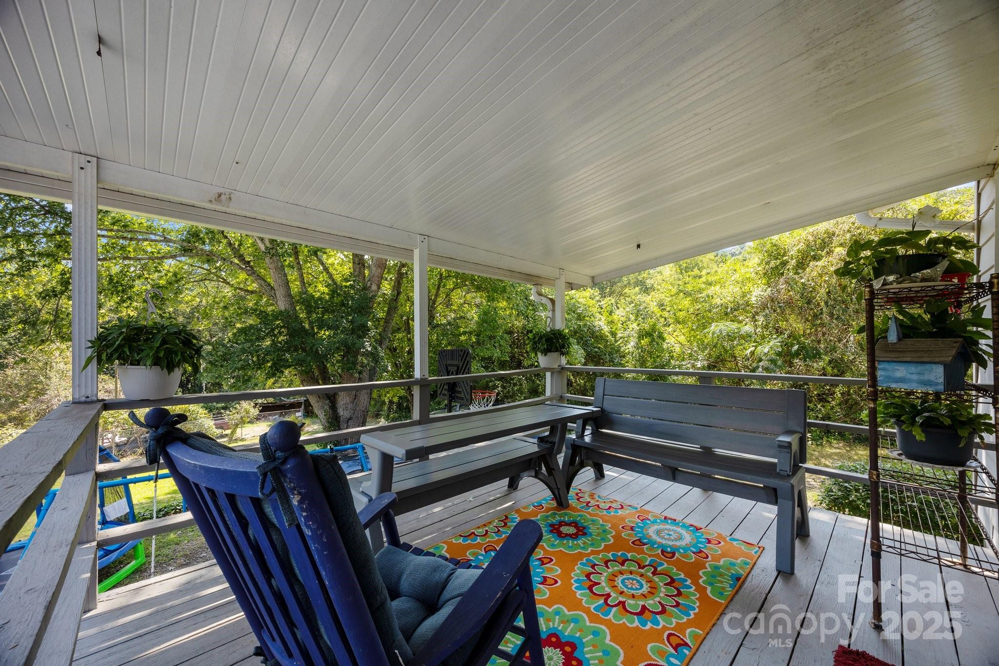 204 Cedar Hill Road Asheville, NC 28806 - Photo 18 of 25 a view of a two chairs in the patio