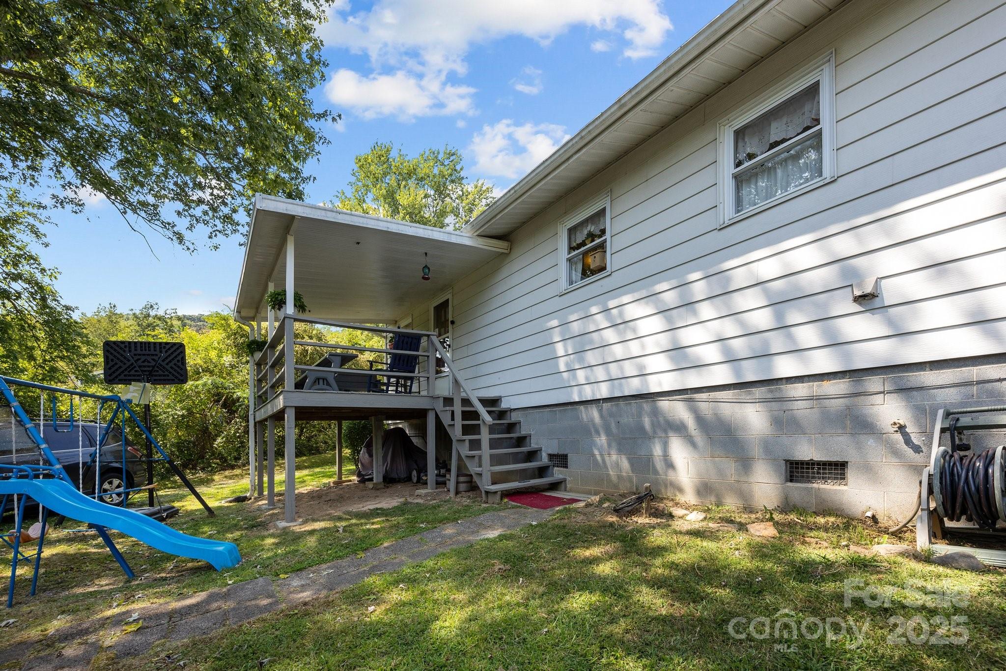 204 Cedar Hill Road Asheville, NC 28806 - Photo 20 of 25 a view of a house with a patio