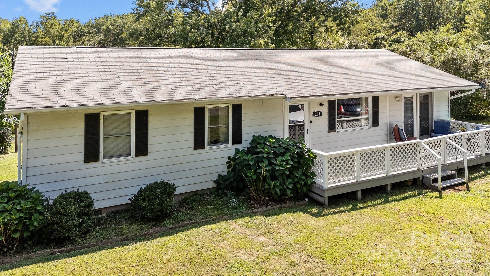 204 Cedar Hill Road Asheville, NC 28806 - Photo 2 of 25 a aerial view of a house having patio