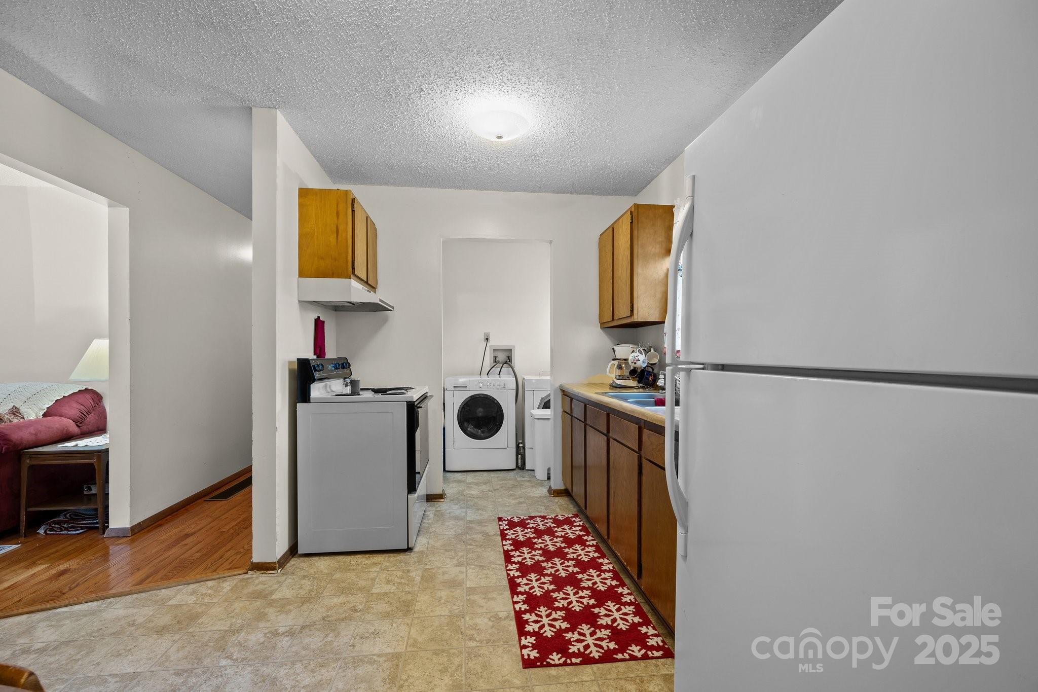 204 Cedar Hill Road Asheville, NC 28806 - Photo 9 of 25 a room with storage and utility