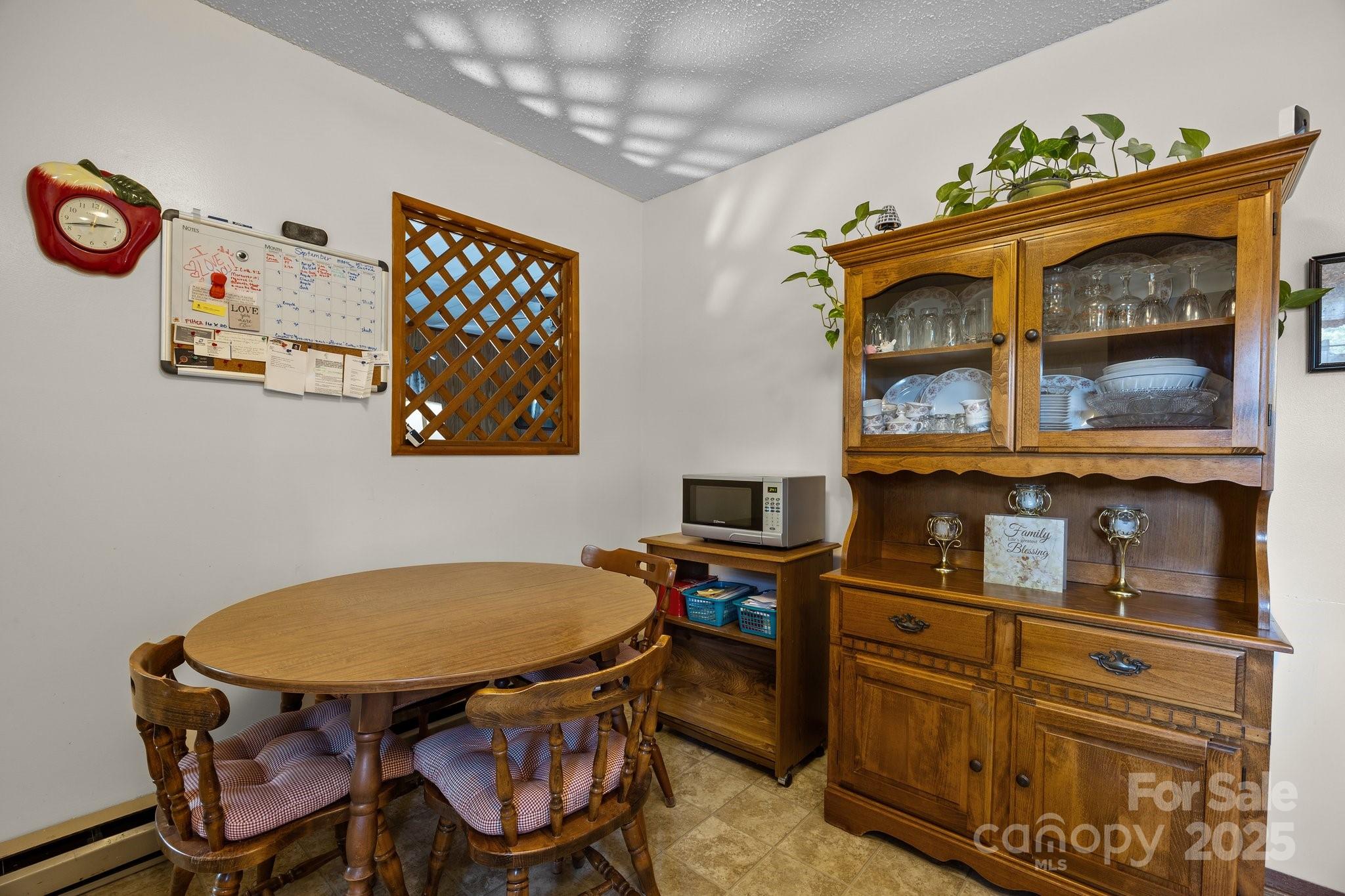 204 Cedar Hill Road Asheville, NC 28806 - Photo 10 of 25 a view of a dining room with furniture