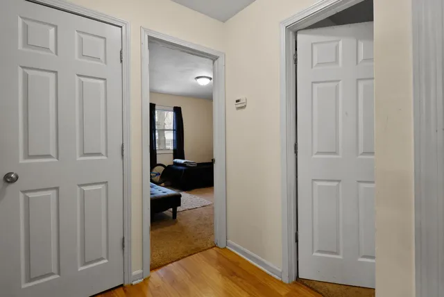 a view of a livingroom from a hallway