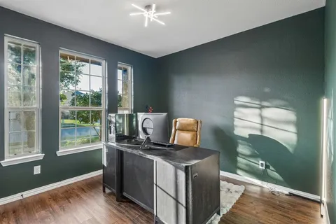 a view of kitchen with granite countertop window and washer