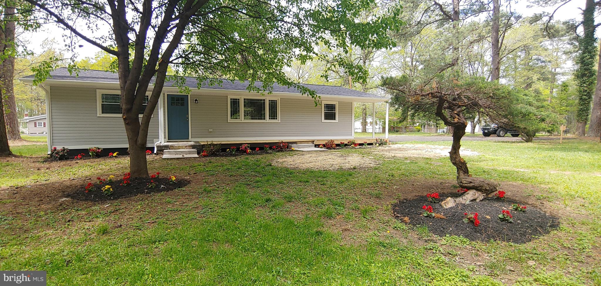 15655 Woodland Point Road Newburg, MD 20664 - Photo 3 of 52 Front with fresh mulch & flowers