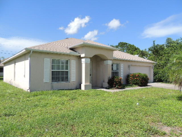 1031 Southwest Becker Road Port St. Lucie, FL 34953 - Photo 2 of 17 Side Left