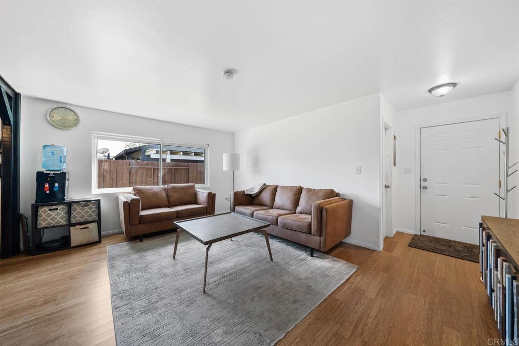 565 June Way El Cajon, CA 92021 - Photo 14 of 42 a living room with furniture and a wooden floor