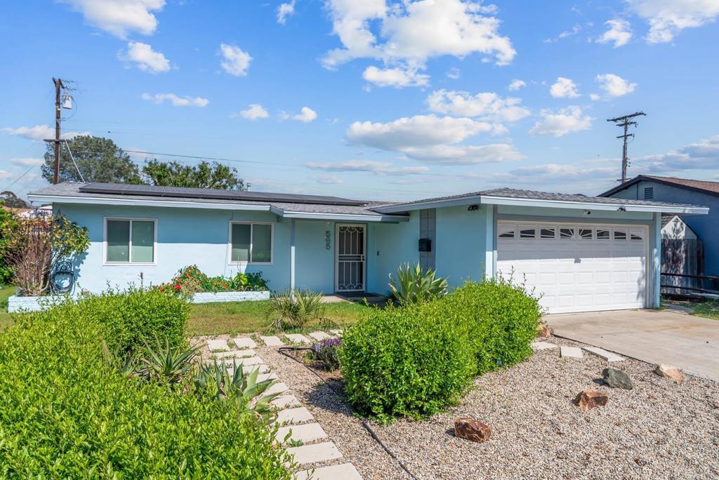 565 June Way El Cajon, CA 92021 - Photo 36 of 42 a front view of a house with garden