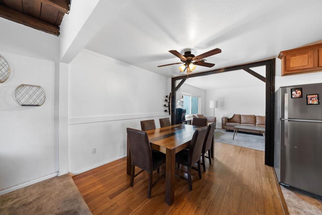 565 June Way El Cajon, CA 92021 - Photo 5 of 42 a view of a dining room with furniture window and wooden floor