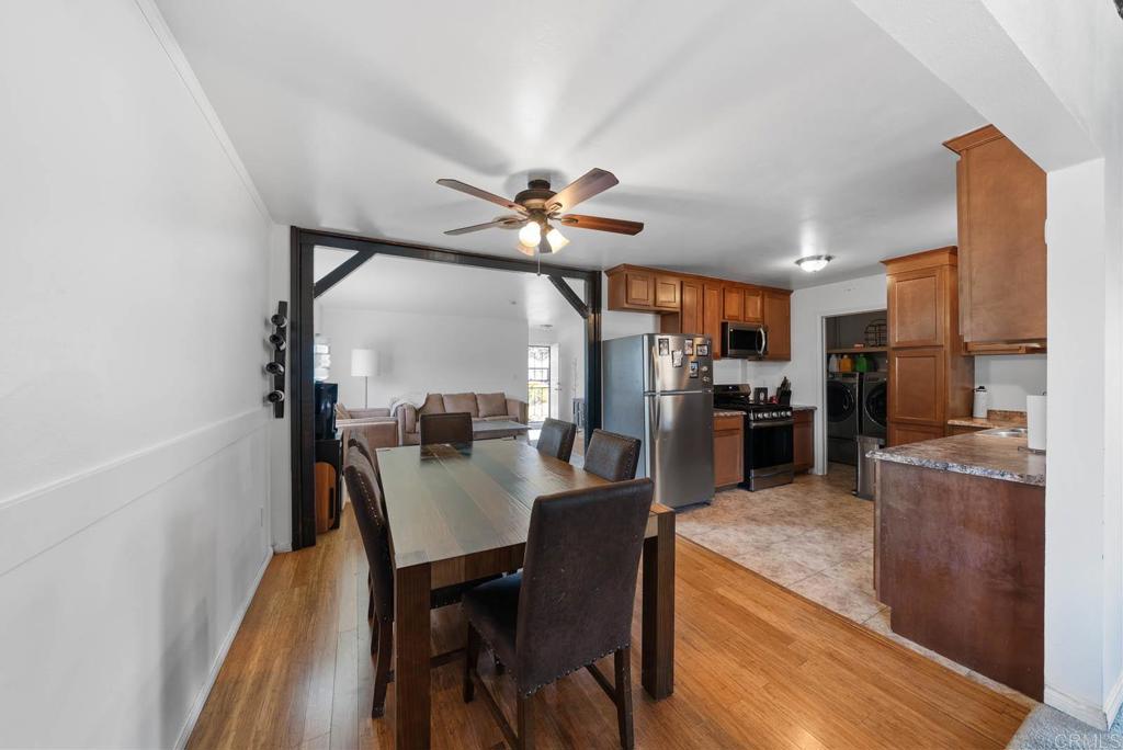 565 June Way El Cajon, CA 92021 - Photo 6 of 42 a view of a dining room with furniture and a chandelier