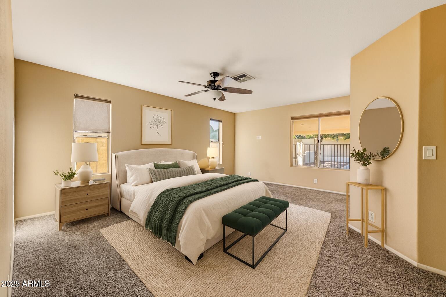 2015 East Bendix Drive Tempe, AZ 85283 - Photo 13 of 31 a spacious bedroom with a bed and a chandelier