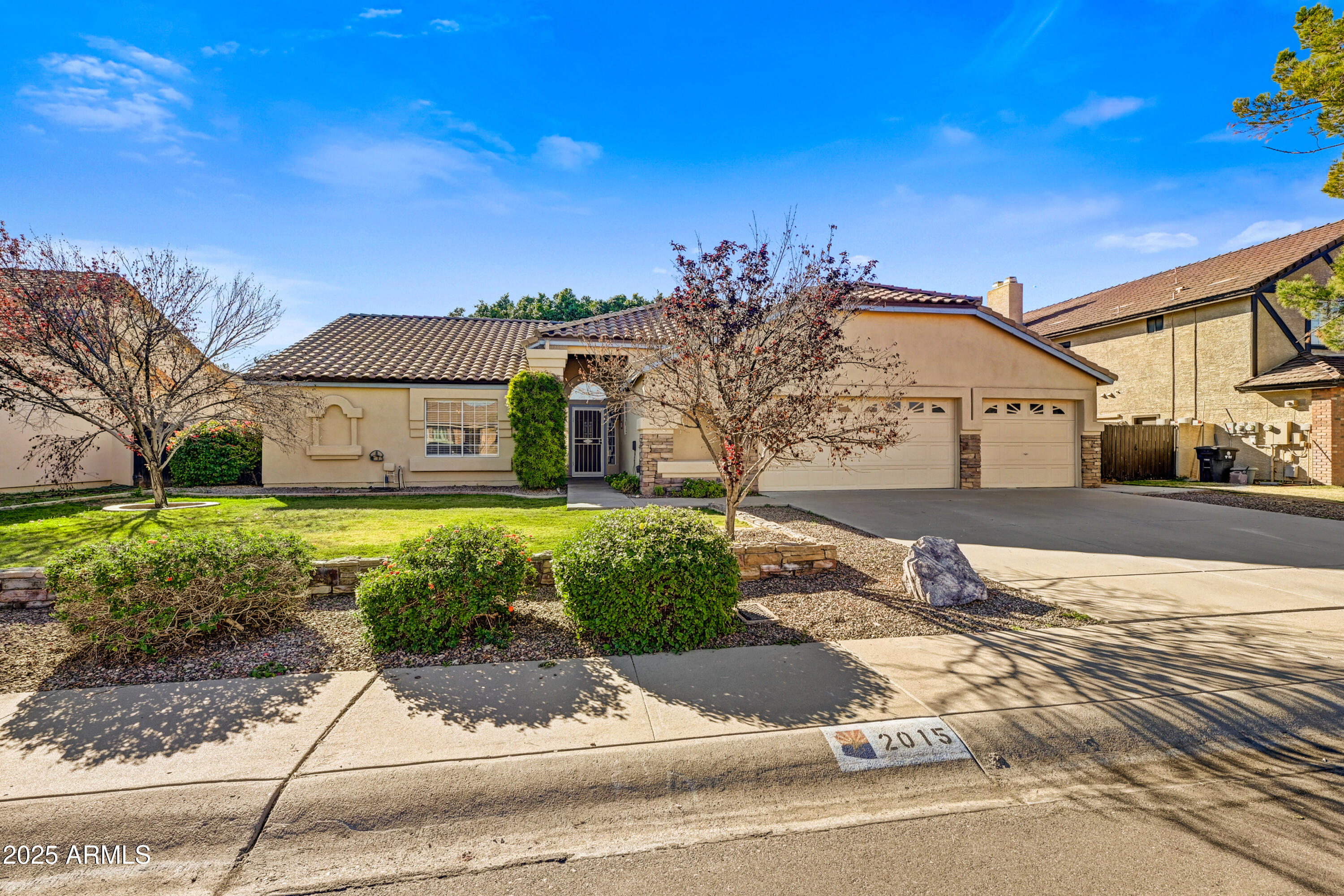 2015 East Bendix Drive Tempe, AZ 85283 - Photo 2 of 31 a front view of a house with a yard