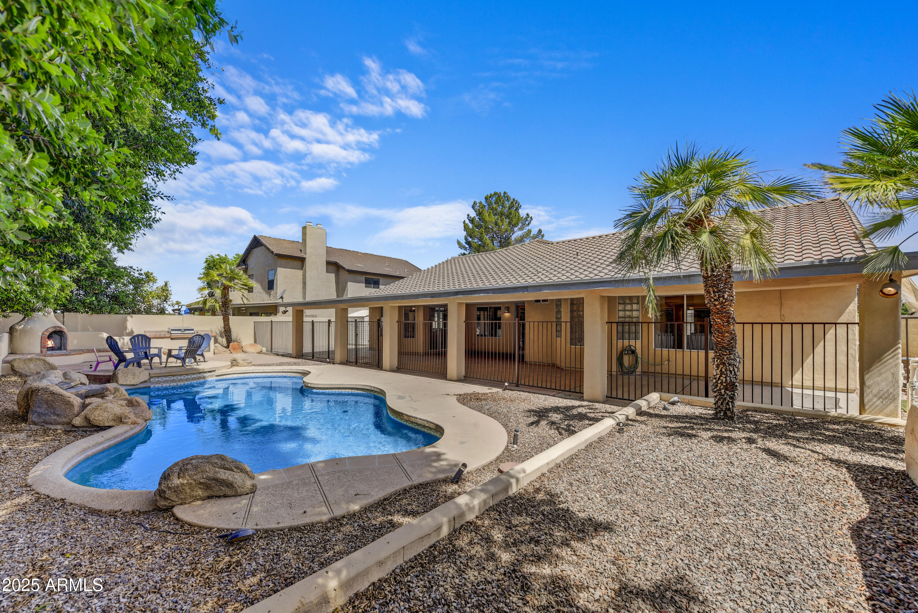 2015 East Bendix Drive Tempe, AZ 85283 - Photo 29 of 31 a view of a house with backyard porch and sitting area
