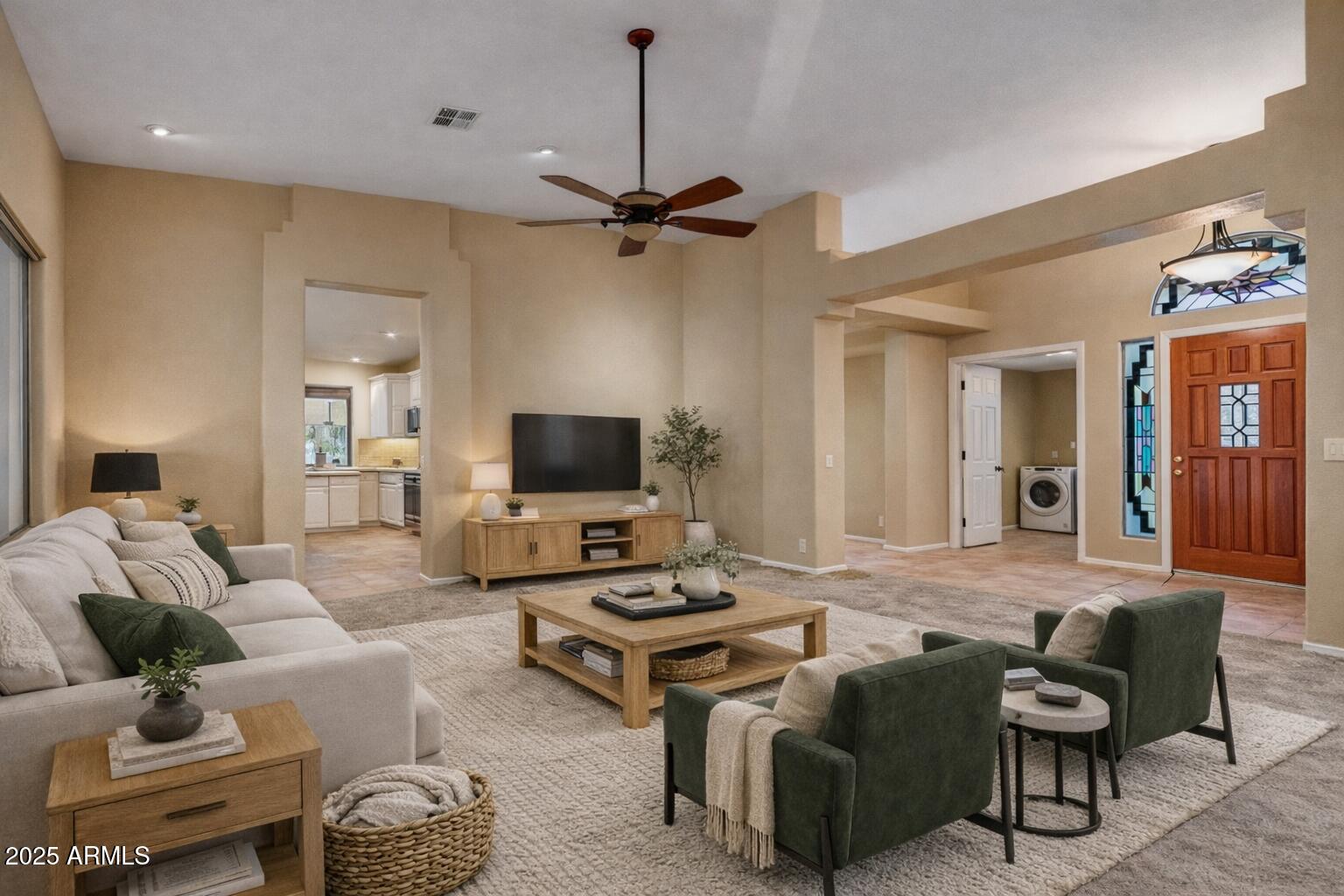 2015 East Bendix Drive Tempe, AZ 85283 - Photo 6 of 31 a living room with furniture a flat screen tv and a window