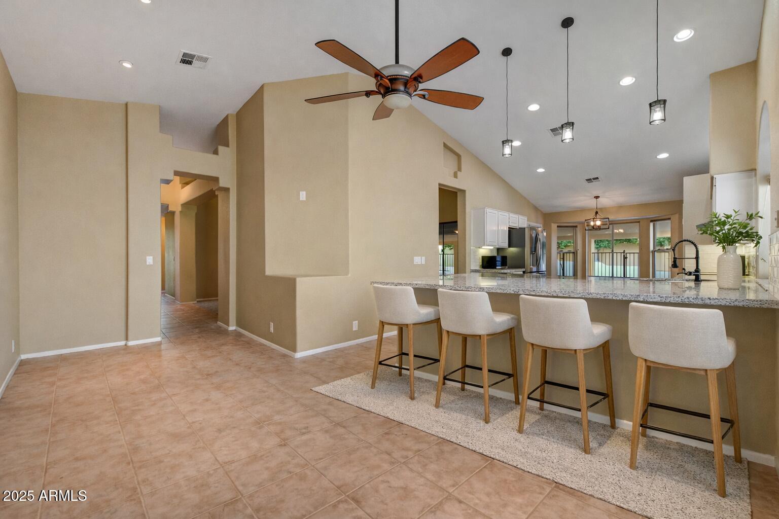 2015 East Bendix Drive Tempe, AZ 85283 - Photo 8 of 31 a view of a livingroom with furniture and a ceiling fan