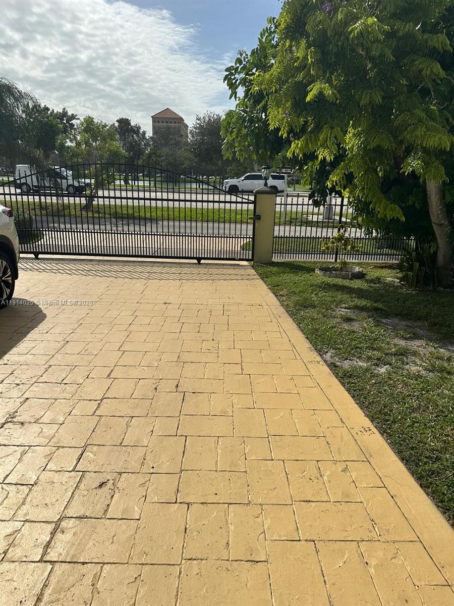 9101 Southwest 88th Street, Unit 1 Miami, FL 33173 - Photo 6 of 10 a view of a wrought fence