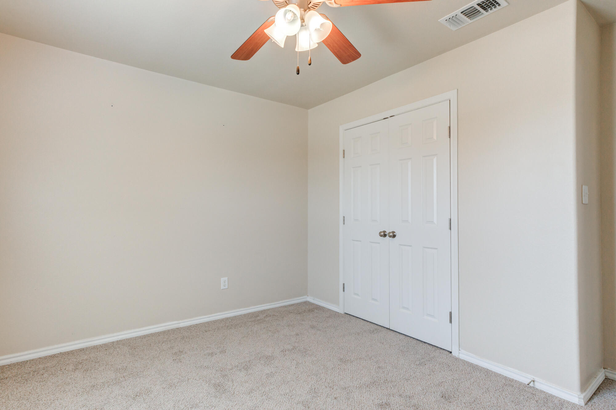 7518 87th Street Lubbock, TX 79424 - Photo 21 of 36 a view of an empty room
