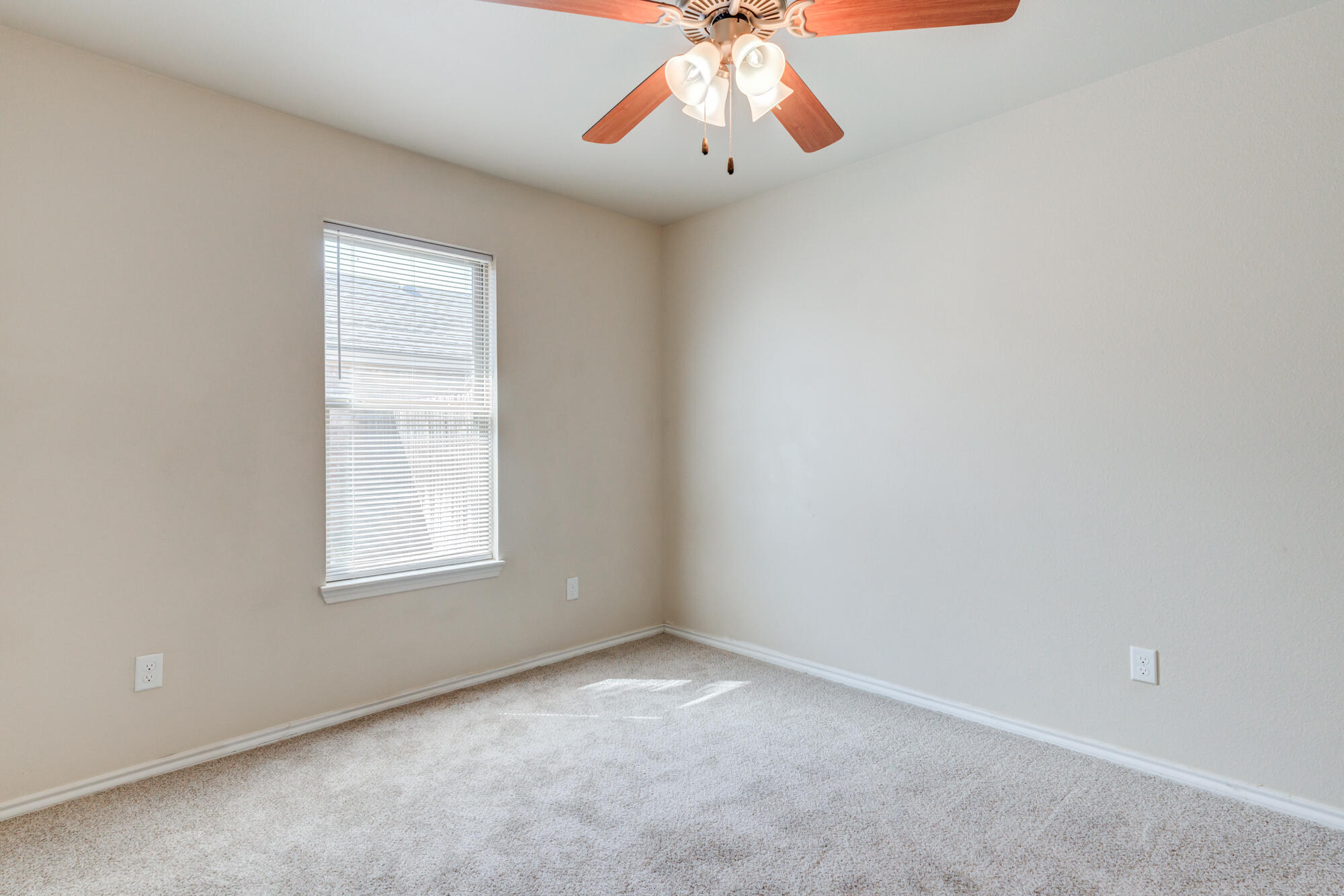 7518 87th Street Lubbock, TX 79424 - Photo 23 of 36 an empty room with a window