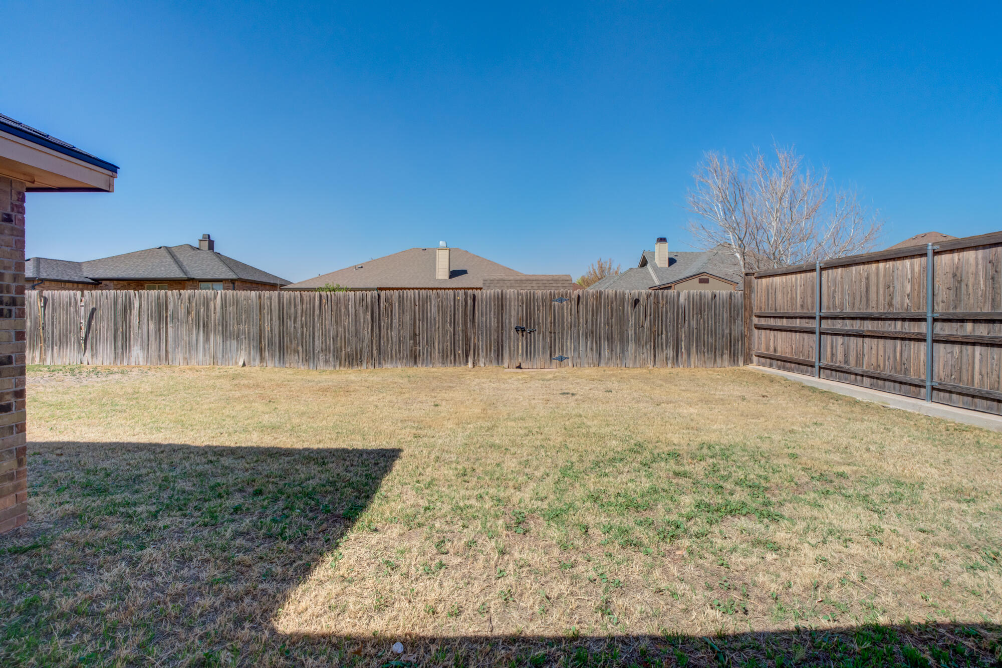 7518 87th Street Lubbock, TX 79424 - Photo 35 of 36 a view of a backyard of a house