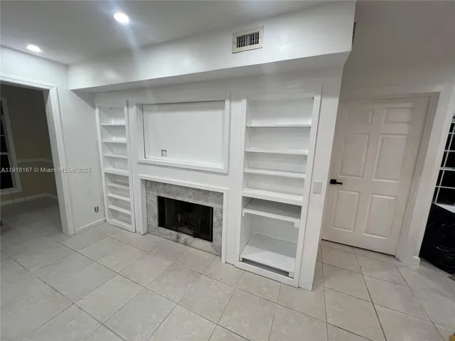 a view of a porch with a small yard