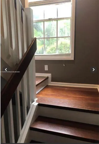 a view of a garden with a tree