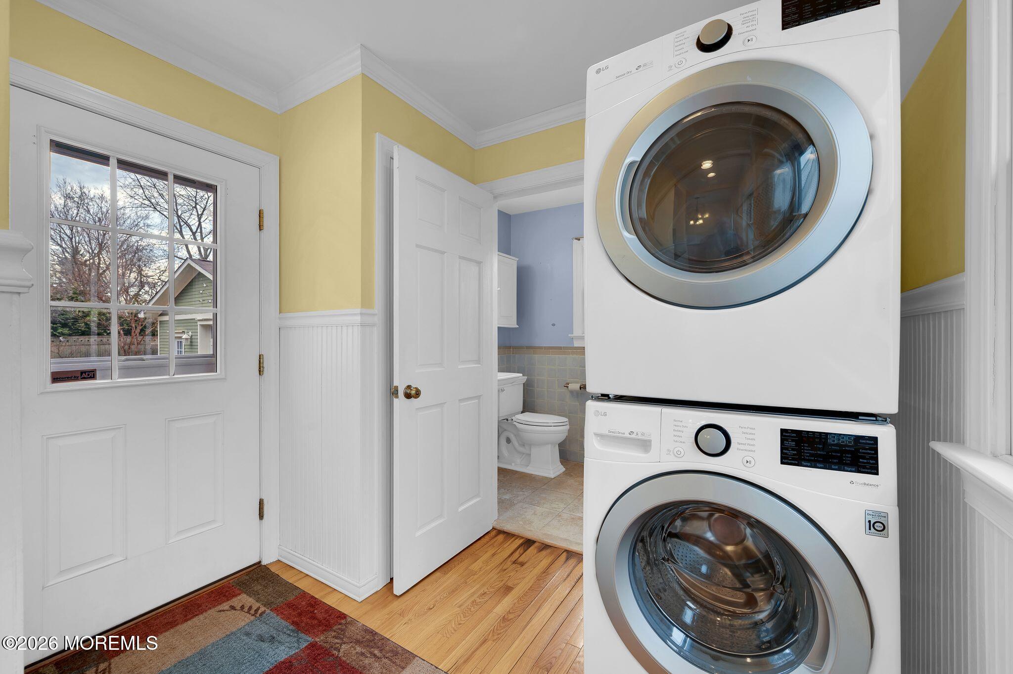 1405 Wanamassa Road Asbury Park, NJ 07712 - Photo 17 of 42 a view of a hallway with washer and dryer