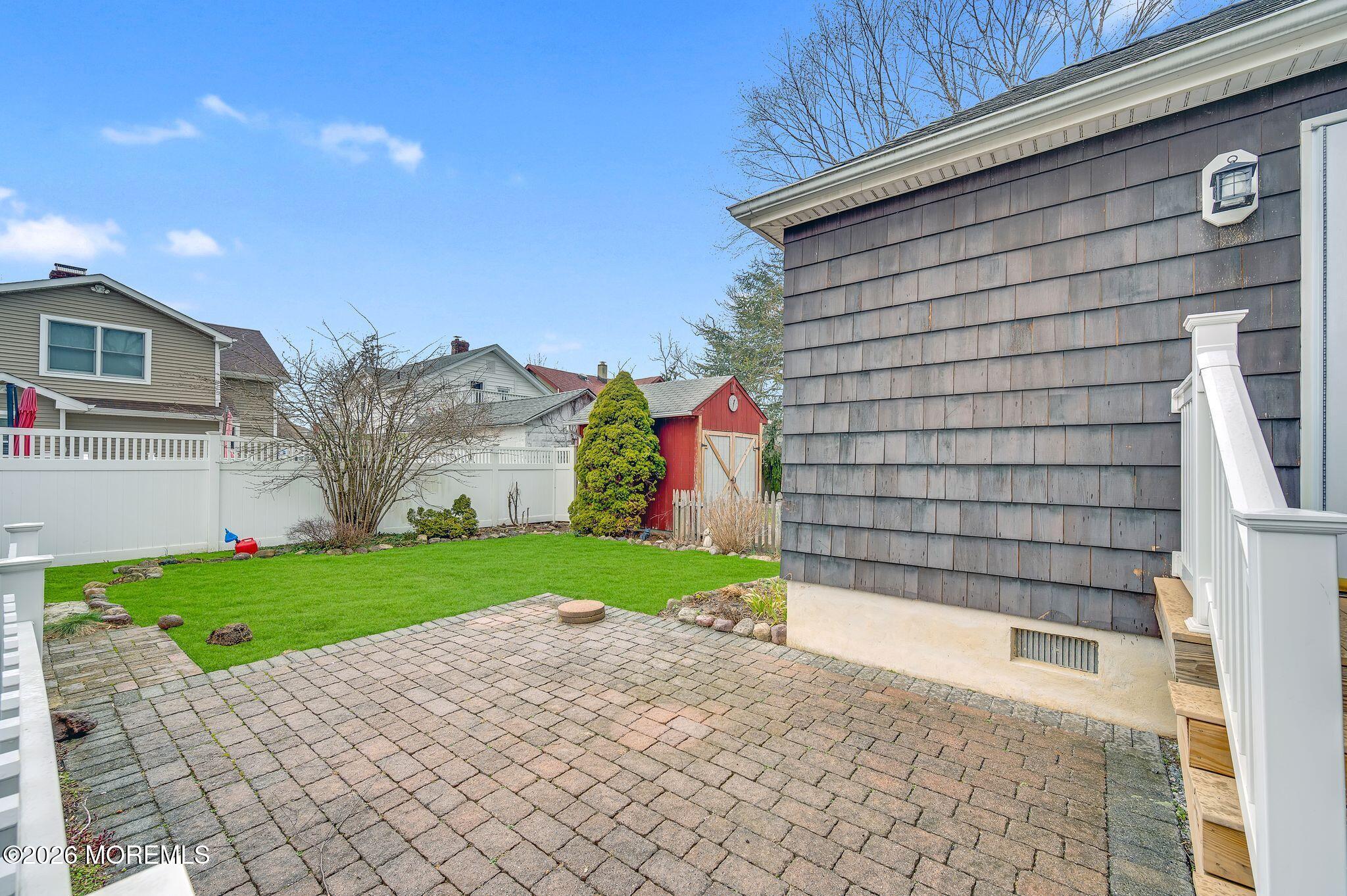 1405 Wanamassa Road Asbury Park, NJ 07712 - Photo 27 of 42 a house view with a backyard space