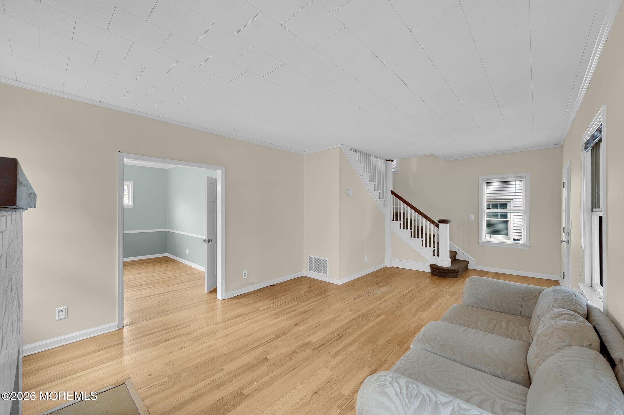 1405 Wanamassa Road Asbury Park, NJ 07712 - Photo 9 of 42 a view of livingroom with furniture and wooden floor