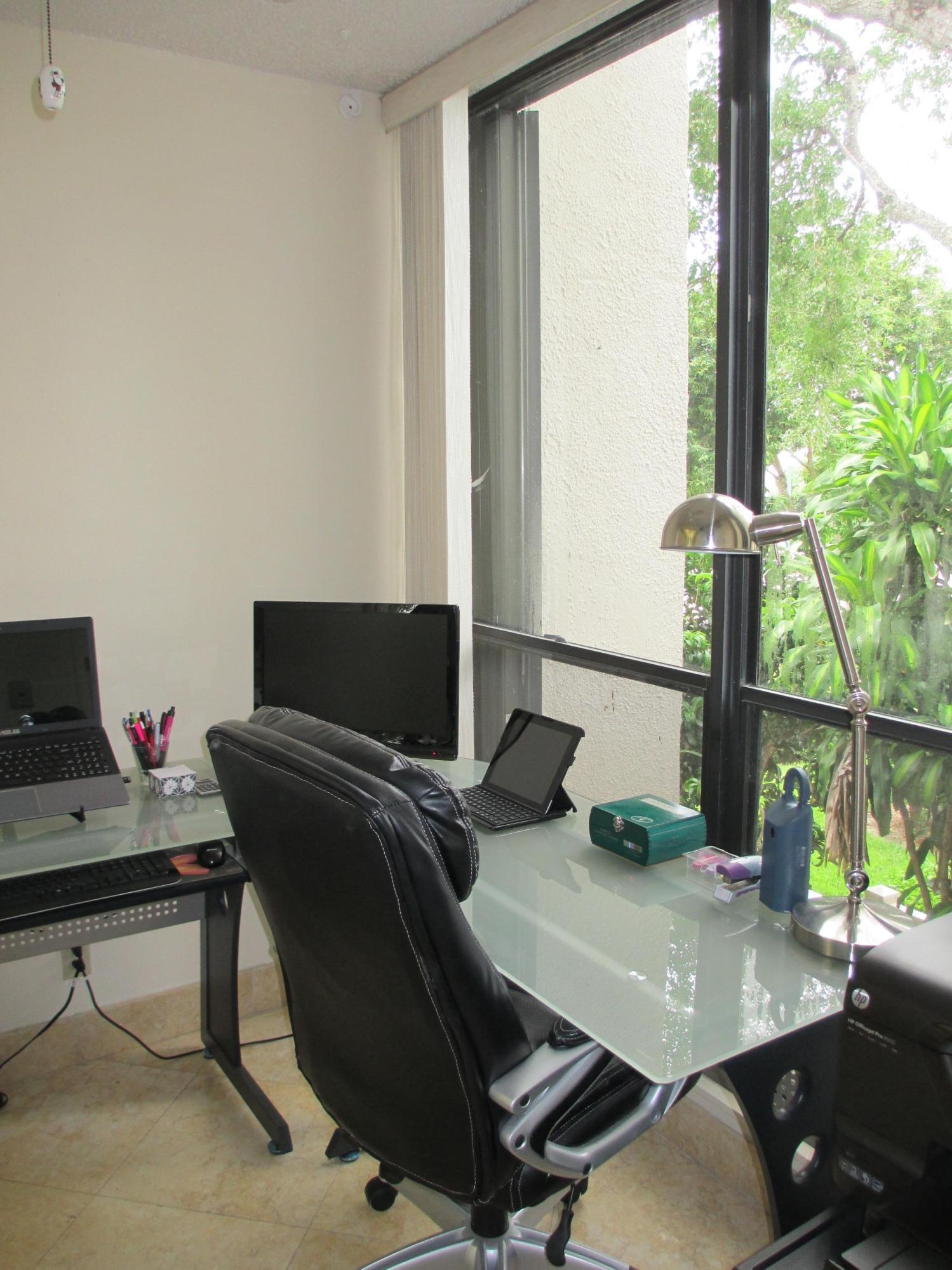 1405 Bridgewood Drive, Unit 1405 Boca Raton, FL 33434 - Photo 15 of 45 a view of workspace with a window
