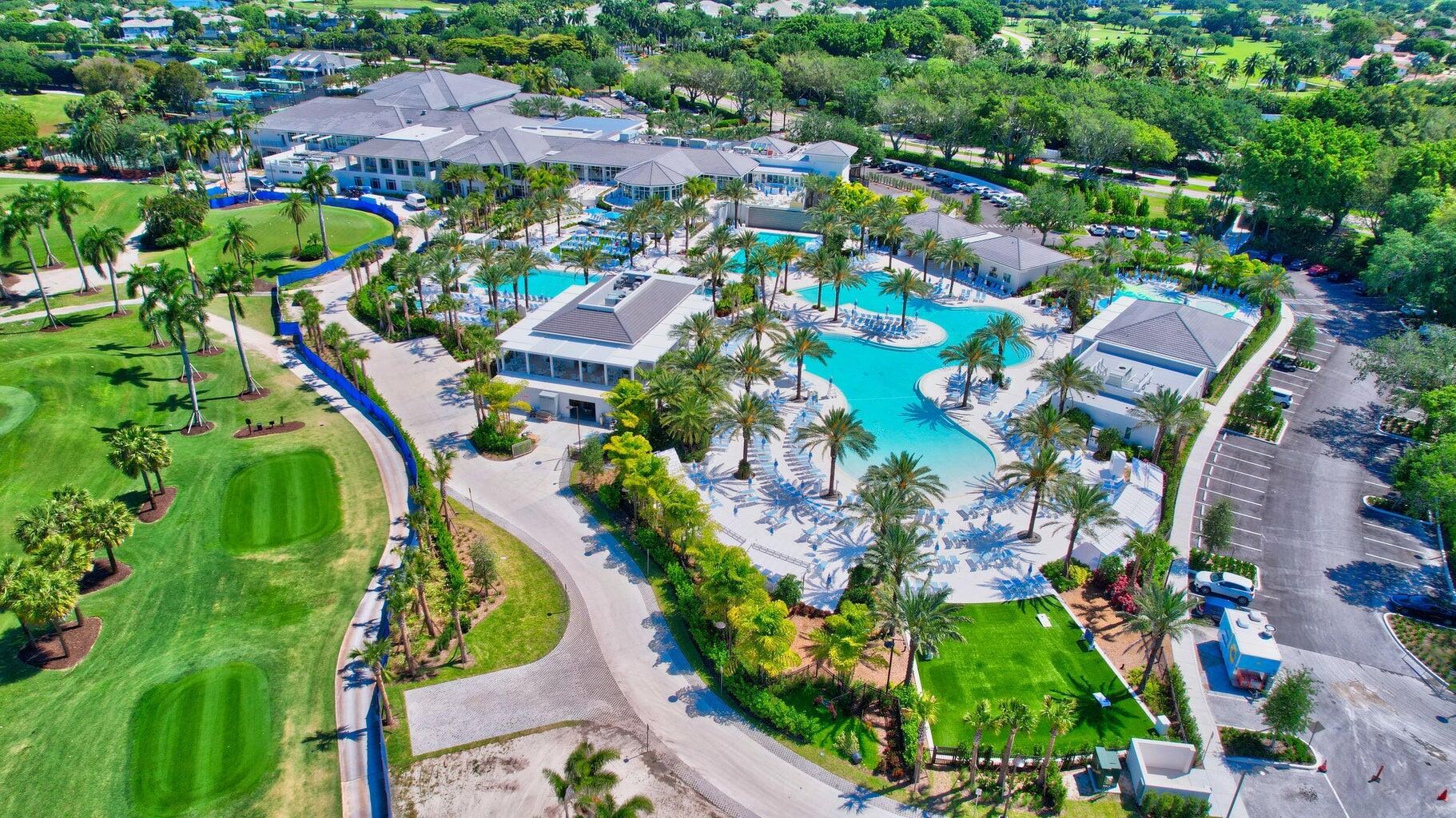 1405 Bridgewood Drive, Unit 1405 Boca Raton, FL 33434 - Photo 40 of 54 an aerial view of residential houses with outdoor space