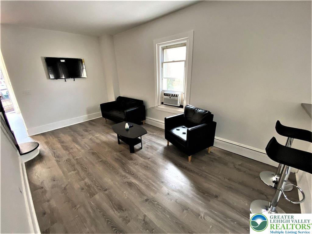 517 Thomas Street Bethlehem, PA 18015 - Photo 16 of 30 a living room with furniture and a flat screen tv