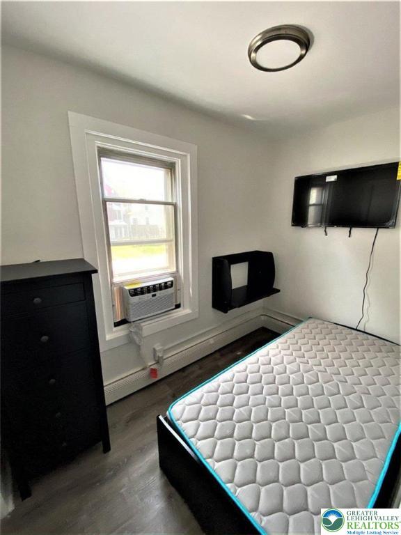 517 Thomas Street Bethlehem, PA 18015 - Photo 20 of 30 a bedroom with a bed and a window