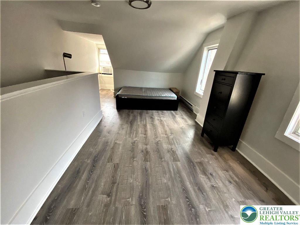 517 Thomas Street Bethlehem, PA 18015 - Photo 29 of 30 a view of a hallway with wooden floor and stairs