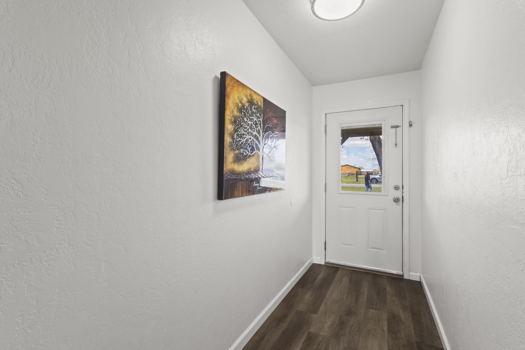 19961 Englin Road Winnie, TX 77665 - Photo 10 of 26 a view of hallway with wooden floor