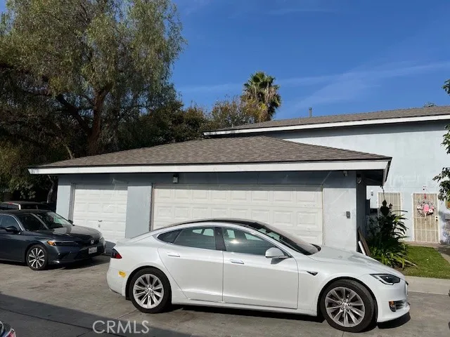 a car parked in front of a house