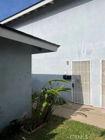 a house with trees in front of it