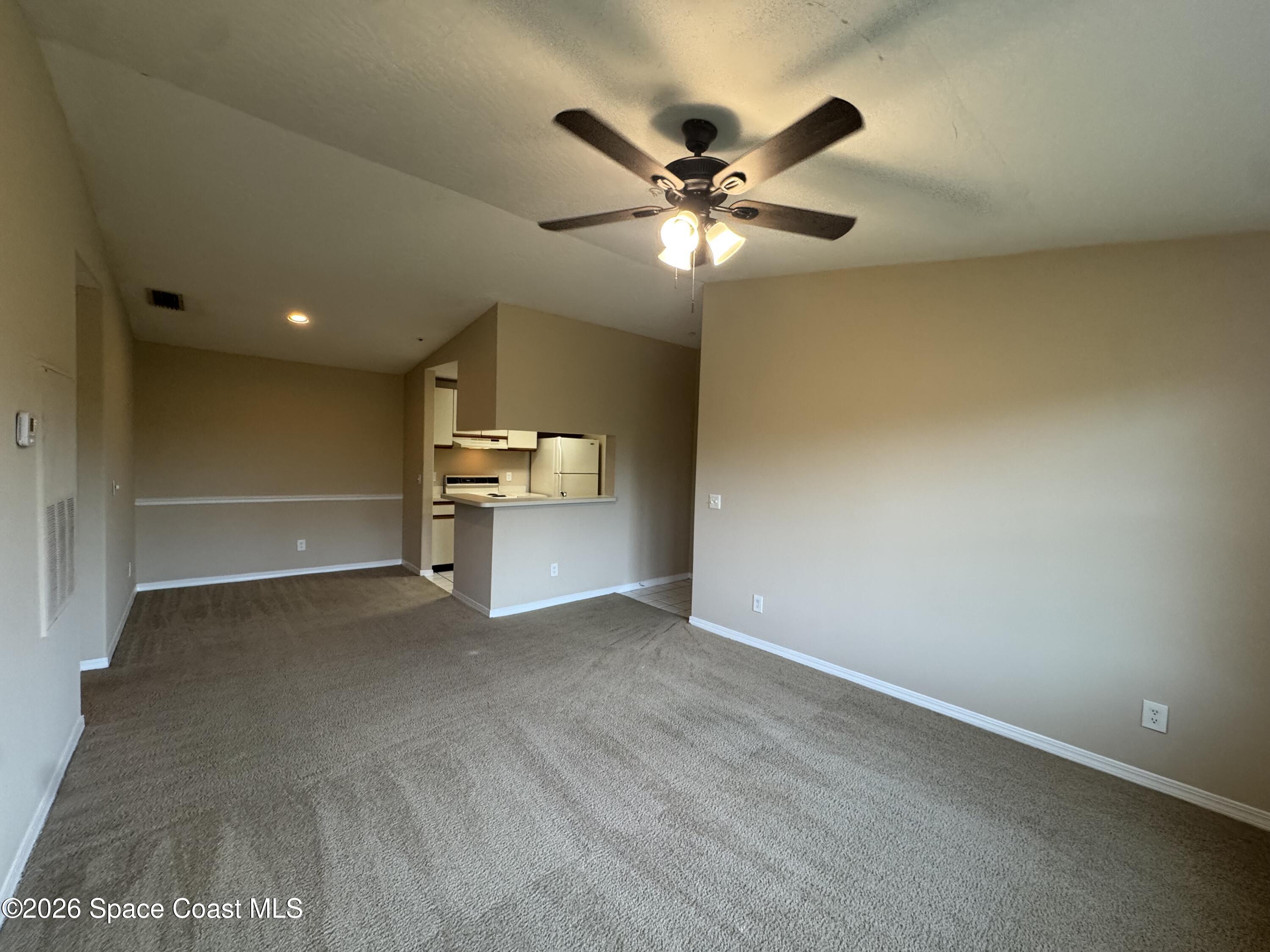7667 North Wickham Road, Unit 1120 Melbourne, FL 32940 - Photo 4 of 20 IMG_7122