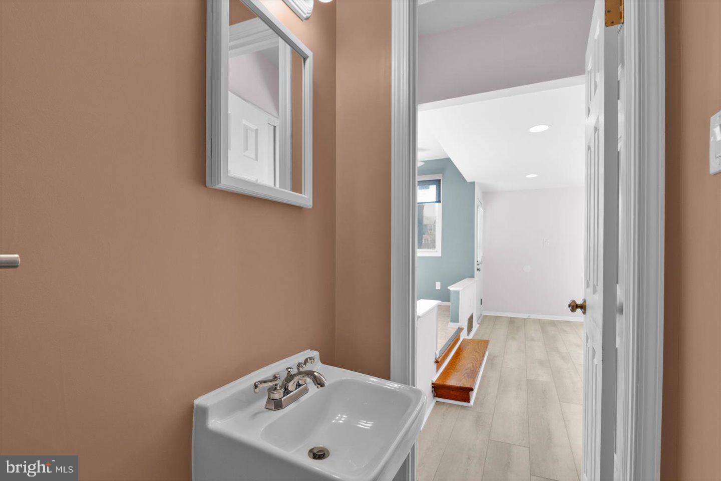 104 Lamp Post Lane Cherry Hill, NJ 08003 - Photo 22 of 44 a bathroom with a sink and a mirror