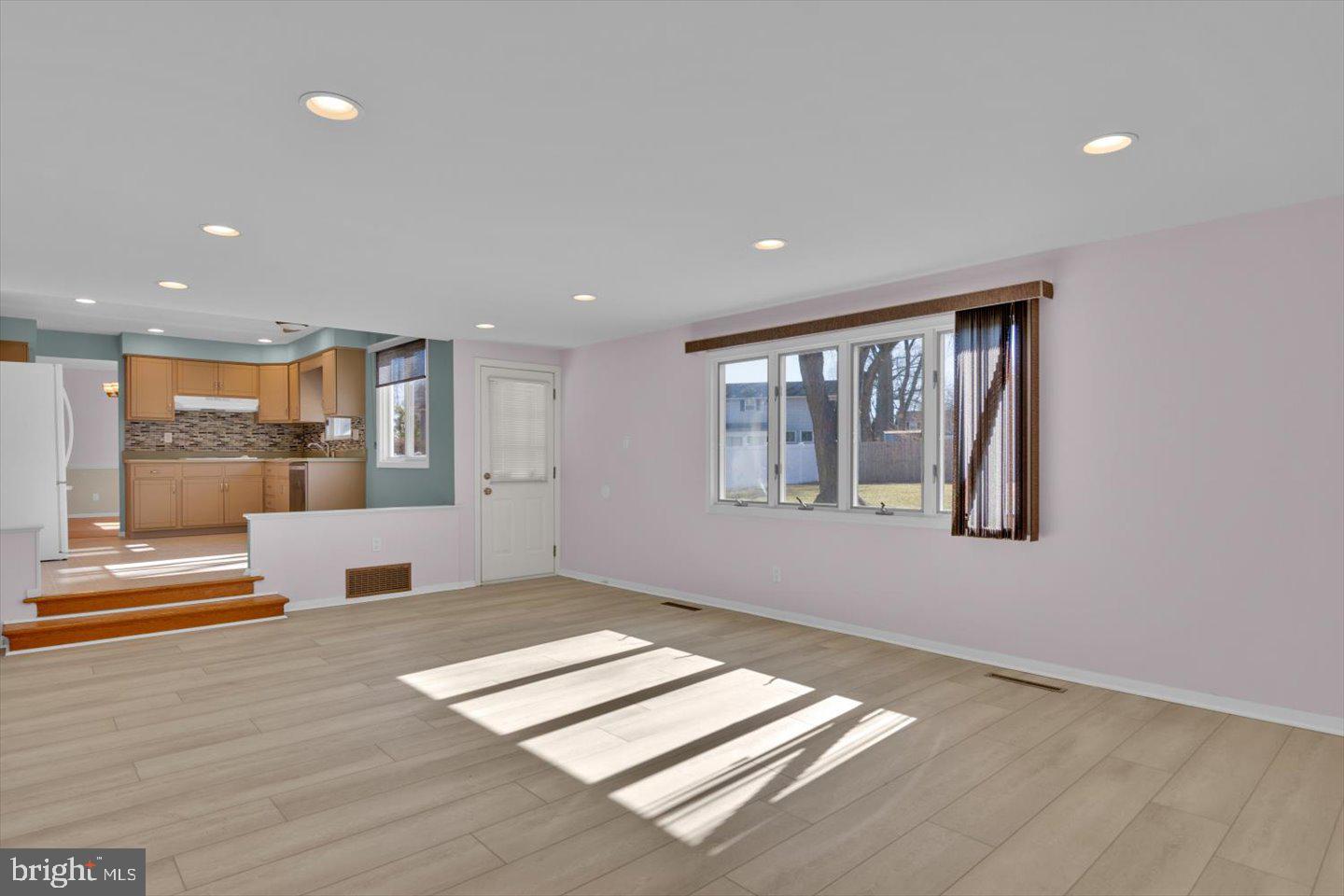 104 Lamp Post Lane Cherry Hill, NJ 08003 - Photo 23 of 44 wooden floor and windows in a room